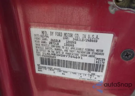 1994 Lincoln Town Car Executive z USA, uszkodzony, nr VIN 1LNLM81W3RY704691